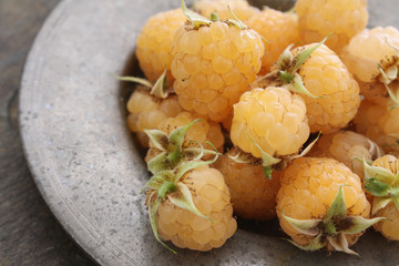 fresh ripe gold raspberries