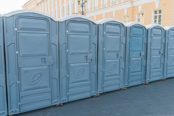 streets of the city closed on a padlock public toilets - obrazy, fototapety, plakaty
