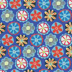 Retro flower seamless vector background. 1960s, 1970s floral design. Red, blue, and yellow doodle flowers on a blue background. Vintage flower pattern for fabric, paper, wallpaper, web banners, kids