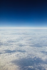 Fototapeta na wymiar high sky above the clouds, blue atmosphere background