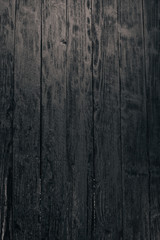 Old vintage wooden black background. Top view. Free space for your text.