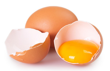 Raw eggs on white background