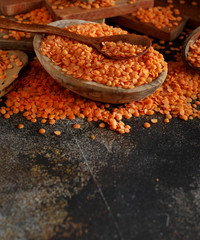 Red lentils in a bowl with a spoon