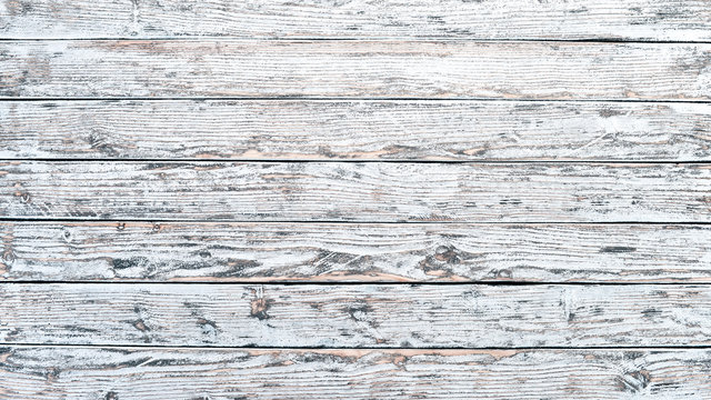 Old vintage wooden white background. Top view. Free space for your text.