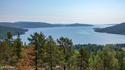Fototapeta na wymiar Beautiful view of archipelago, mountains, forest and sea. Skule mountain, high coast in northern Sweden.