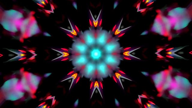 video en forma de caleidoscopio de mandala girando y cambiando que se abren en  figurasgeometricas y de flores  formadas con movimiento en colores y fondo negro