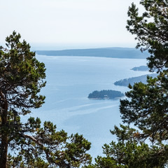 Fototapeta na wymiar Beautiful view of archipelago, mountains, forest and sea. Skule mountain, high coast in northern Sweden.