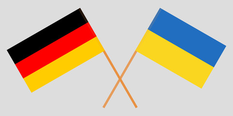 Crossed flags Ukraine and Germany. Official colors. Correct proportion. Vector