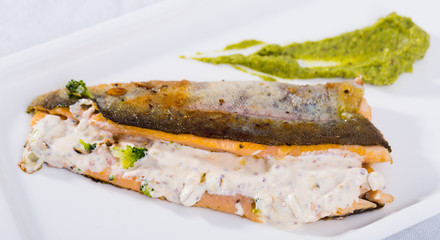 Grilled quail with vegetables and greens