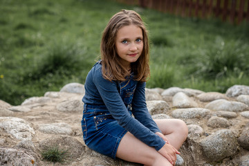 brunette brown hair teenage girl in denim spring outdoor 