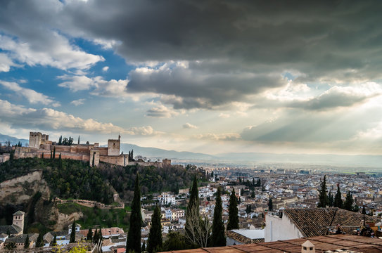 Cityscape of Granada, Spain, with the Alhambra Palace in the background