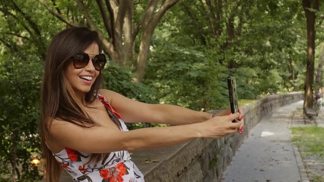 Beautiful Latina Hispanic Woman Takes a Selfie