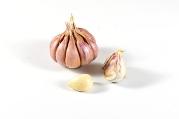 A few bulbs of garlic isolated on a white background