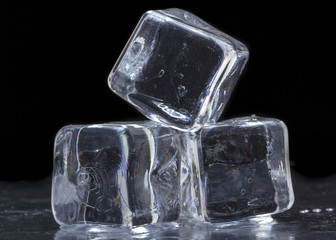 ice cubes on a black backgroundstacked pyramid