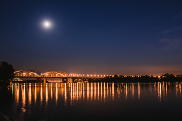 Darnitskiy bridge across Dnepr river at night. Kiev, Ukraine