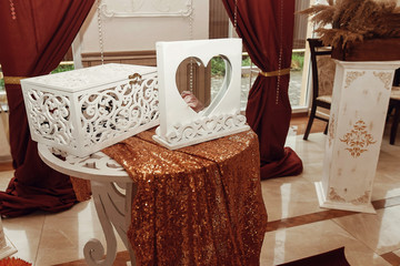 gift box and guest book, wedding arch and aisle, decorated place for wedding ceremony and reception