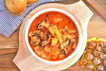 Pineapple and  Mussel Curry coconut soup (Thai name is Gang Kua Supparod)