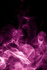 Purple smoke on black background