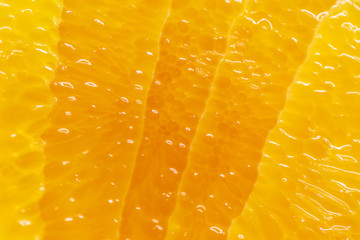 Flesh of juicy ripe orange as background or backdrop