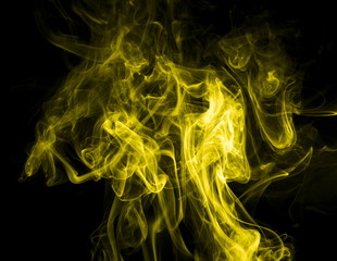 Yellow smoke on black background