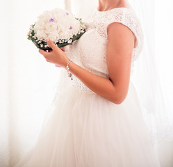 Bride near the window