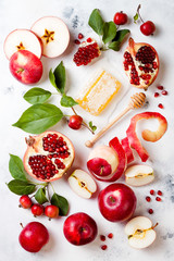 Apple, pomegranate and honey, traditional food of jewish New Year - Rosh Hashana.