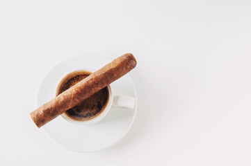Cup and Turk coffee, cigar and guillotine isolated on white background.