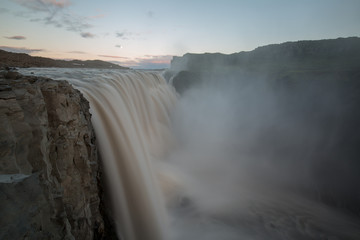 waterfall in iceland in the mountain