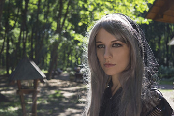 Naklejka premium Portrait of Girl in a park