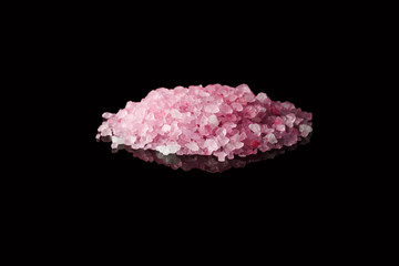 Sea salt heap isolated on black background