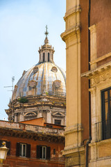 Obraz premium View on a historic church in Rome, Italy on a sunny day.