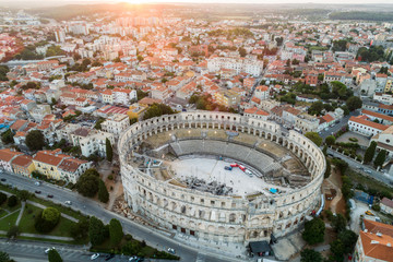 Fototapeta premium Roman Colosseum in Pula, Croatia at sunrise