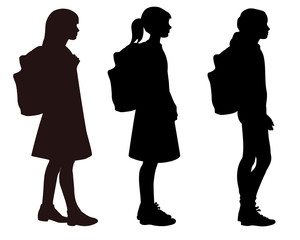 three isolated silhouettes of girls standing with school backpacks