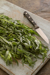 preparing fresh tarragon herb