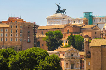 Fototapeta na wymiar Landscape view of the historic buildings of Rome, Italy on a sunny day.