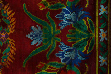 Fragment of the ornament. Embroidered in a hand-made carpet	