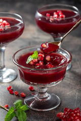 Pomegranate jelly decorated fresh mint
