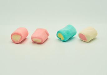 Colorful marshmallows candy isolated on white background