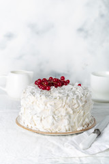 Coconut Cake decorated red currant