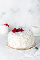 Coconut Cake decorated red currant