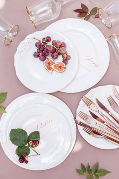 Artistic still life with plates and fruits