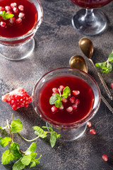 Pomegranate jelly decorated fresh mint