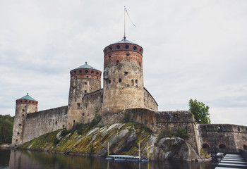 Fototapeta na wymiar View of Olavinlinna, Olofsborg, a 15th-century three-tower castle located in Savonlinna, Southern Savonia, Finland.