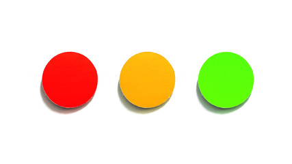 Colored round paper on white background, copy space.