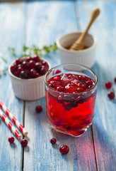 cranberry drink on wooden surface
