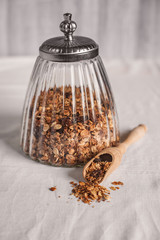 Homemade granola in a glass jar. Selective focus