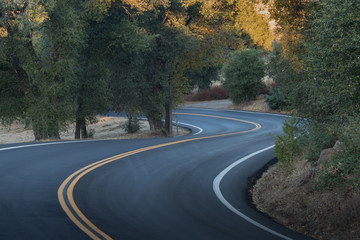 Two lane, winding paved country road in southern califonia