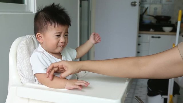 Baby refuses to eat breakfast, Anorexia, Bored with food concept ​