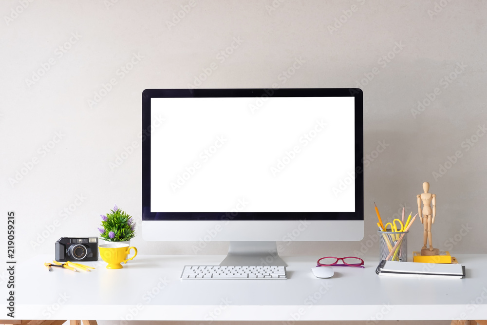 Poster mockup computer on workspace stylish creative table with designer accessories.