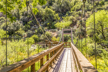 Wooden footbridge along a hiking trail in the Arizona desert